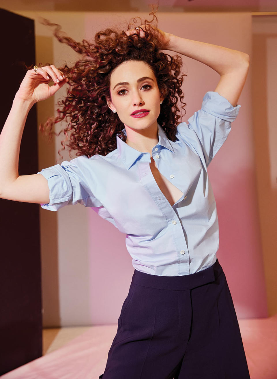 “She’s the original influencer,” says Emmy Rossum of Angelyne, whom she portrays in a new limited series on Peacock. “She was doing this before anybody. She knew the power of her image.” Rossum was photographed April 15 at PMC Studios in New York. - Credit: Photographed by Jenna Greene