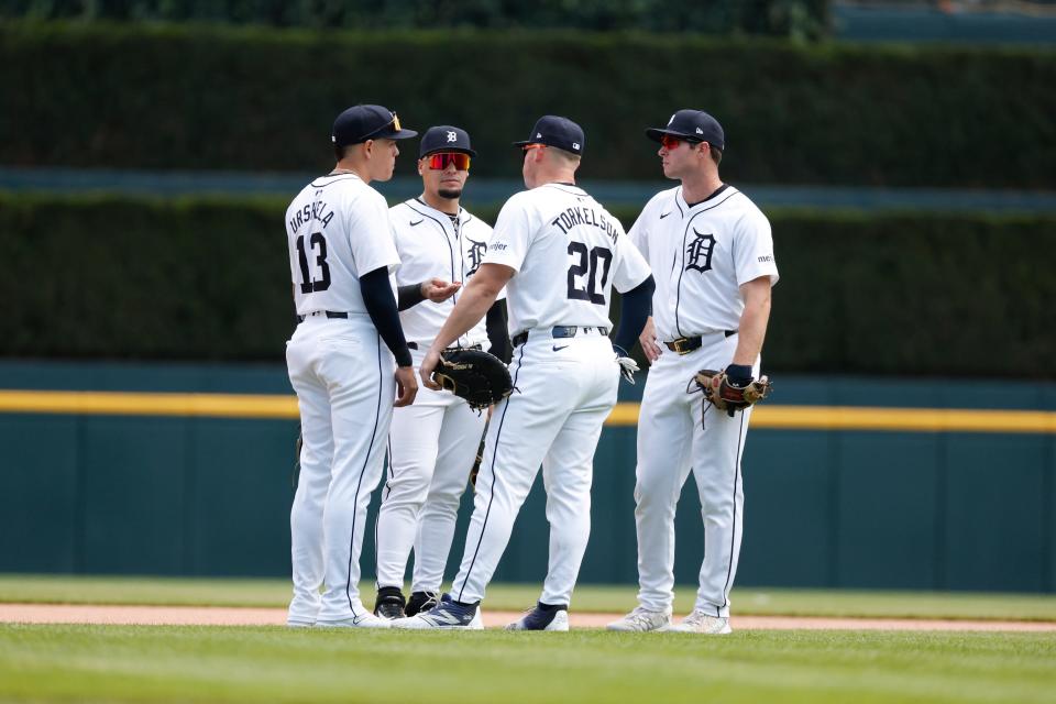 The Detroit Tigers huddle during the game against the Minnesota Twins at Comerica Park on April 14, 2024, in Detroit, Michigan.