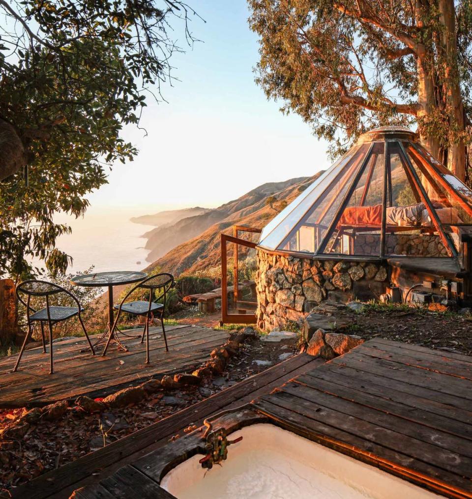 The 30-acre Big Sur estate of architect Mickey Muennig — perched 1,500 feet above the ocean and featuring a home built into the mountainside with an arched skylight, sod garden roof and a separate glass house — has hit the market for $6.95 million.