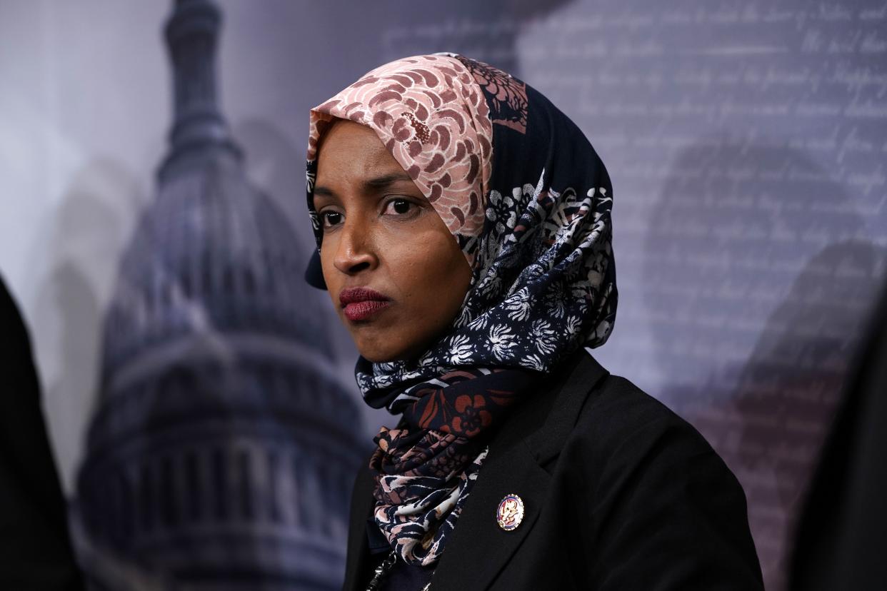 Rep. Ilhan Omar, D-Minn., listens during a news conference on prescription drugs Jan. 10, 2019 at the Capitol in Washington.