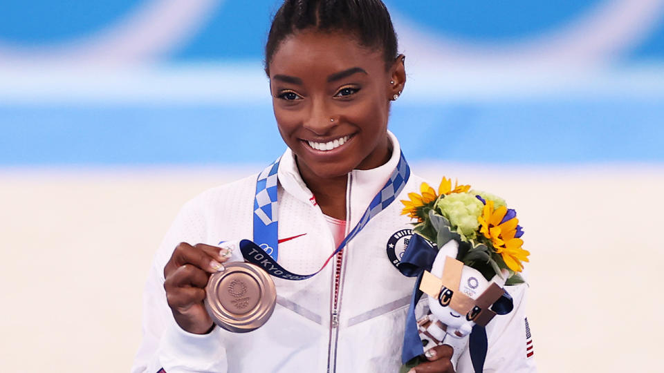 Simone Biles impressively won the bronze medal in the balance beam, after withdrawing from the majority of her Tokyo Olympics program. (Photo by Laurence Griffiths/Getty Images)