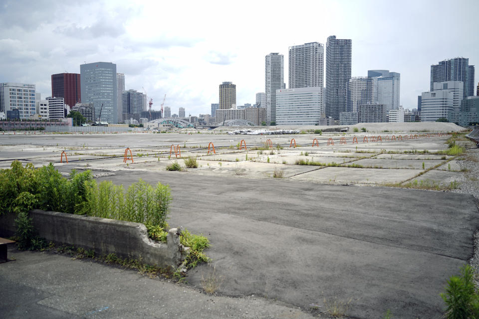 The site of the former Tsukiji Market is seen June 7, 2024, in Tokyo. The site of Tokyo’s famed Tsukiji fish market, left empty after it was razed six years ago, will be replaced by a scenic waterfront stadium and glistening skyscrapers according to plans for its redevelopment that are facing some staunch opposition. (AP Photo/Eugene Hoshiko)