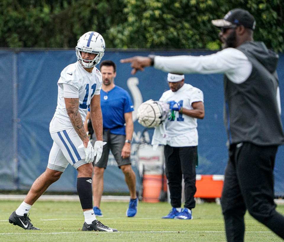 Michael Pittman Jr. (11) runs drills during the Indianapolis Colts mandatory mini training camp on Wednesday, May 8, 2022, at the Indiana Farm Bureau Football Center in Indianapolis. 