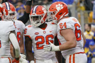 Clemson running back Phil Mafah (26) celebrates with offensive lineman Walker Parks (64) after scoring against Pittsburgh during the first half of an NCAA college football game, Saturday, Oct. 23, 2021, in Pittsburgh. (AP Photo/Keith Srakocic)