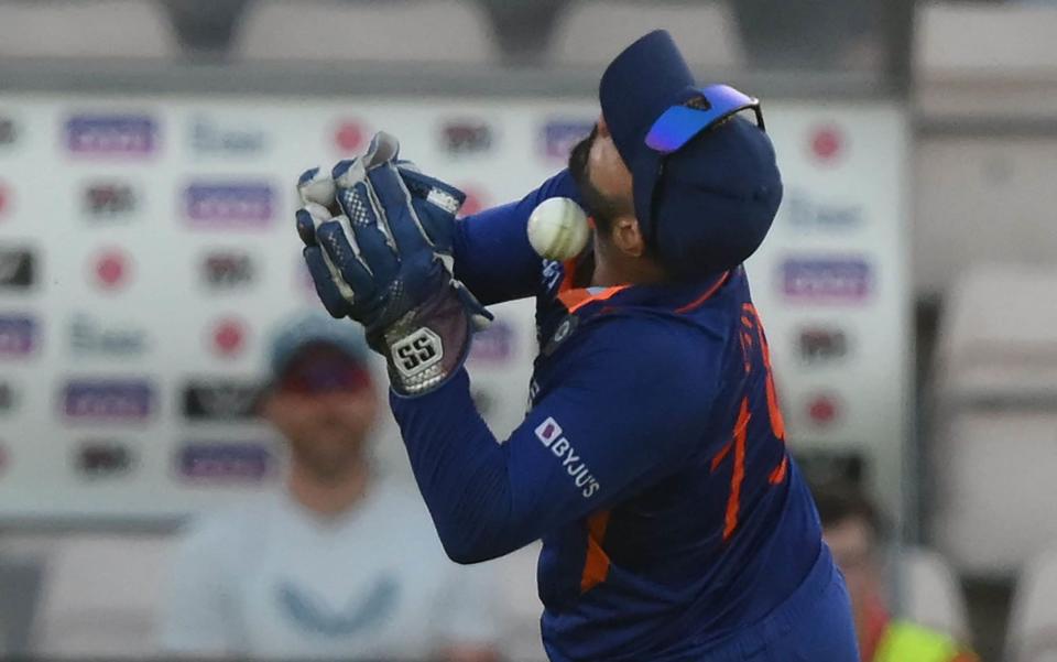 India's Dinesh Karthik drops a catch given up by England's Harry Brook  - DANIEL LEAL/AFP via Getty Images