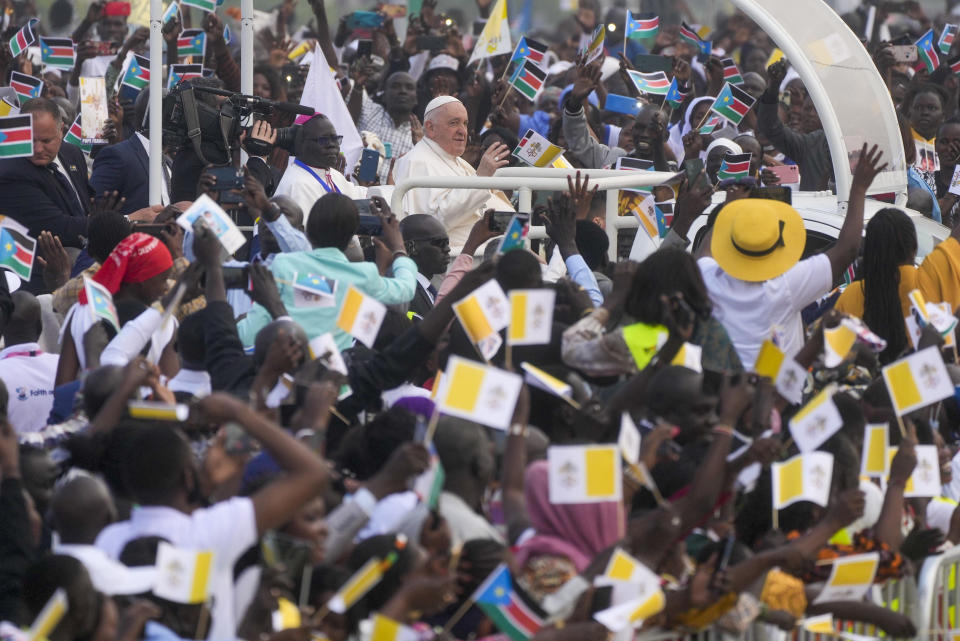 Pope Francis arrives to celebrate mass at the John Garang Mausoleum in Juba, South Sudan, Sunday, Feb. 5, 2023. Francis is in South Sudan on the second leg of a six-day trip that started in Congo, hoping to bring comfort and encouragement to two countries that have been riven by poverty, conflicts and what he calls a "colonialist mentality" that has exploited Africa for centuries. (AP Photo/Gregorio Borgia)