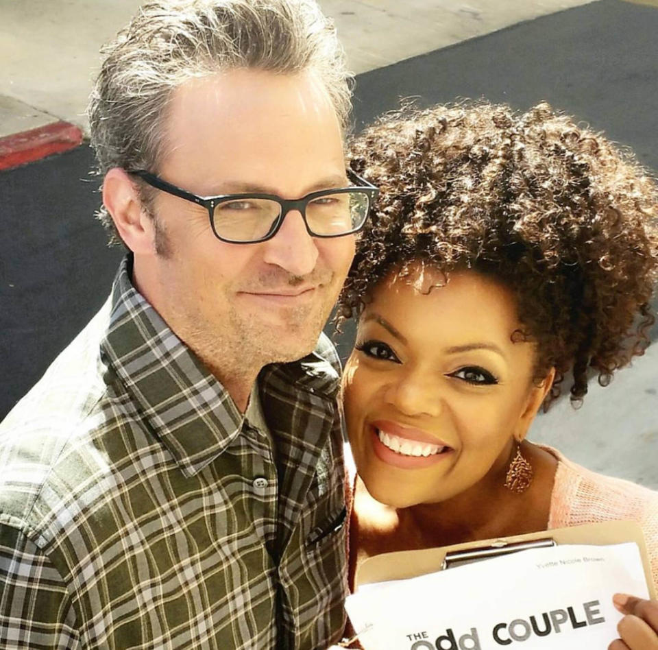 Matthew Perry and Yvette Nicole Brown pose together on set of 