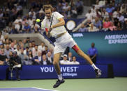 Daniil Medvedev, of Russia, returns a shot to Rafael Nadal, of Spain, during the men's singles final of the U.S. Open tennis championships Sunday, Sept. 8, 2019, in New York. (AP Photo/Charles Krupa)