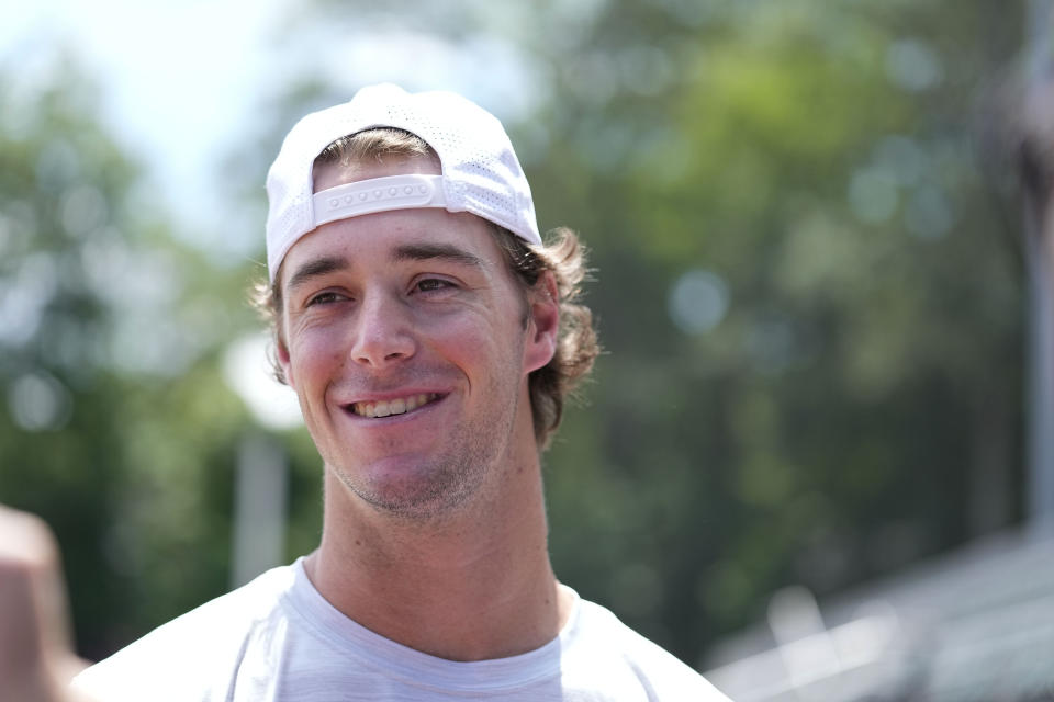 Georgia's Charlie Condon speaks to the media before an NCAA college baseball practice, Wednesday, May 15, 2024, in Athens, Ala. (AP Photo/Brynn Anderson)