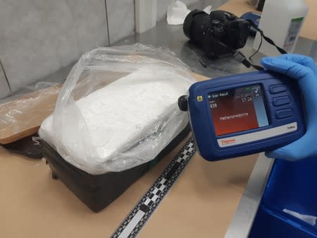 Dutch National Police shows methamphetamine, part of a seizure of 2.5 tonnes in an office building in Rotterdam