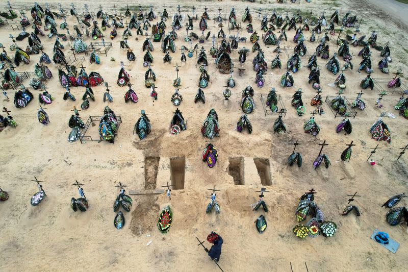 View of new graves for people killed during Russia's invasion of Ukraine, in Irpin