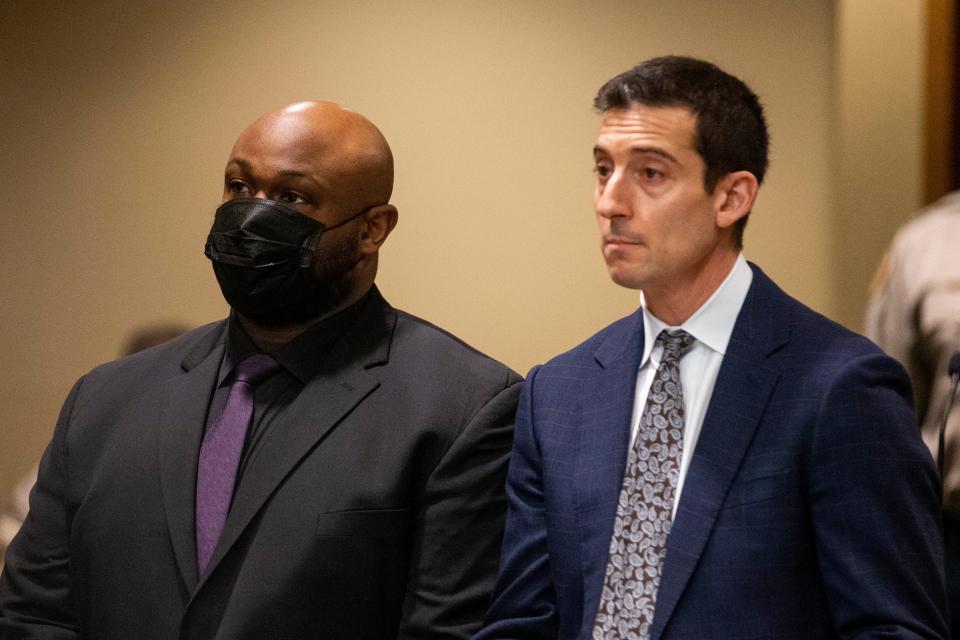 Desmond Mills, Jr., one of the officers charged in the beating of Tyre Nichols, stands in the courtroom next to his defense attorney Blake Ballin during a hearing where the he and the other four officers plead not guilty at the Shelby County Criminal Justice Center in Memphis, on Friday, February 17, 2023. 