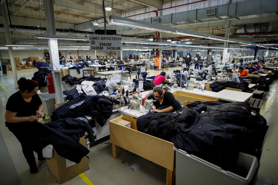 Workers make jackets at the Canada Goose factory in Toronto, Ontario, Canada, February 23, 2018.   REUTERS/Mark Blinch