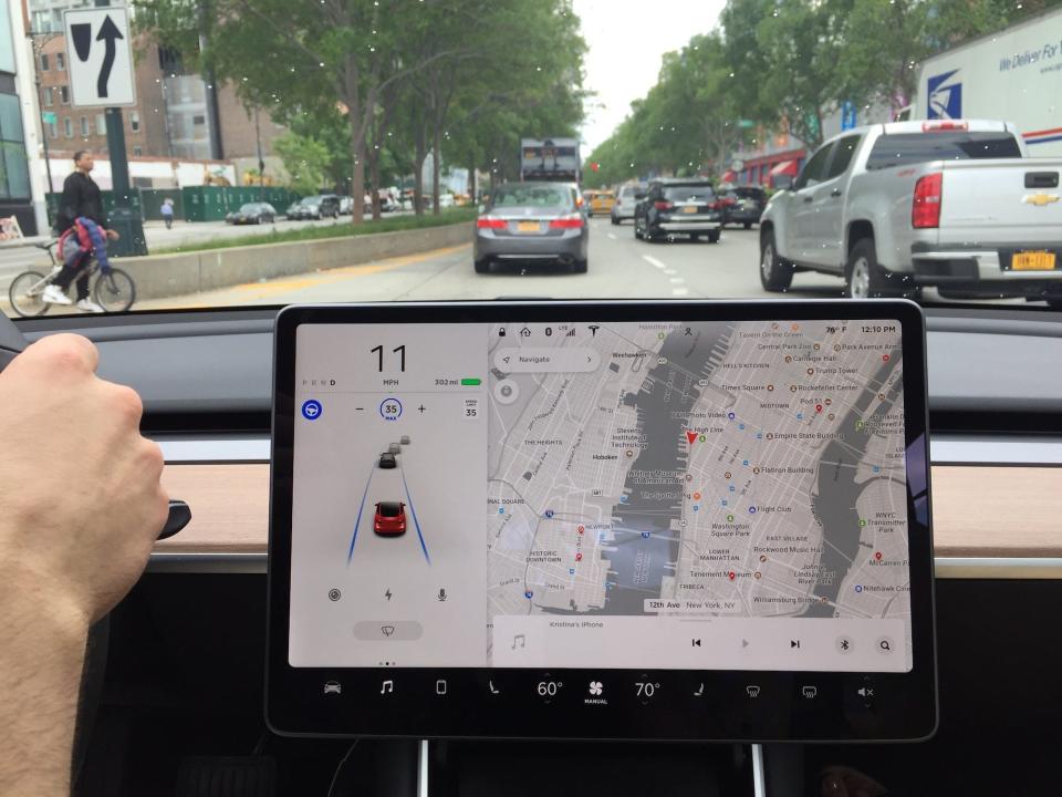 Tesla Autopilot closeup while driving in city