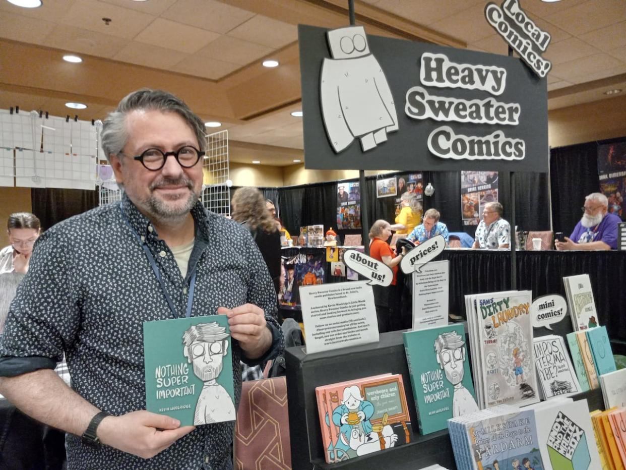 Kevin Woolridge launched Heavy Sweater Comics in November and he has already published seven titles. (Elizabeth Whitten/CBC - image credit)