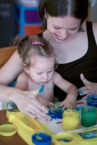 Mother and daughter painting