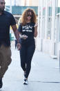 <p>Who wouldn’t want to dress like Rihanna? Sometimes a sassy slogan tee is just the thing to get you motivated in the morning. (Photo by Josiah Kamau/BuzzFoto via Getty Images)</p>