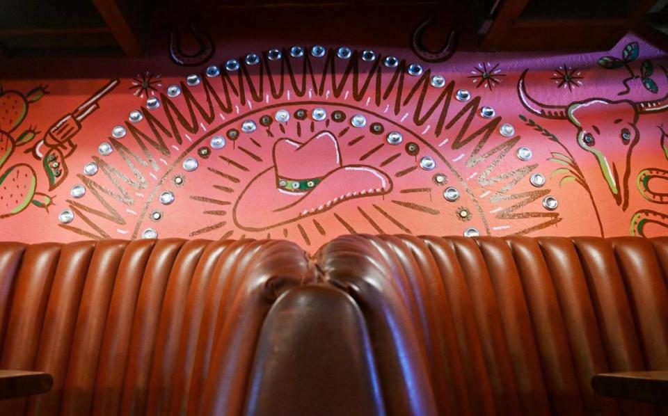 A Western motif decorates the interior of The Backyard Social Club with many repurposed items including booths which came from Madera’s Sugar Pine Smokehouse. Photographed Monday, July 3, 2023 in Clovis.