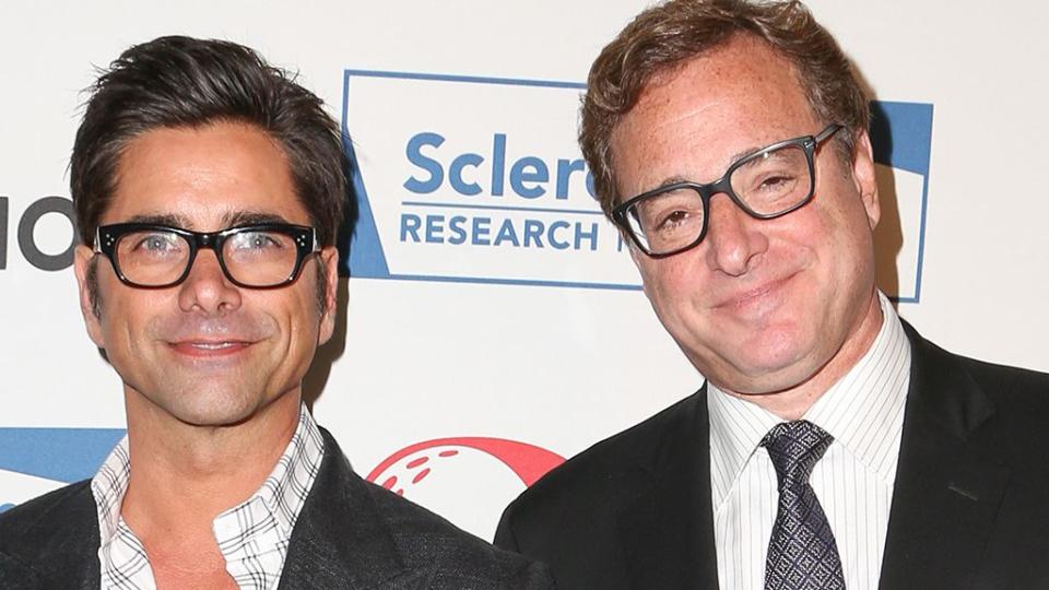 Actors John Stamos (L) and Bob Saget