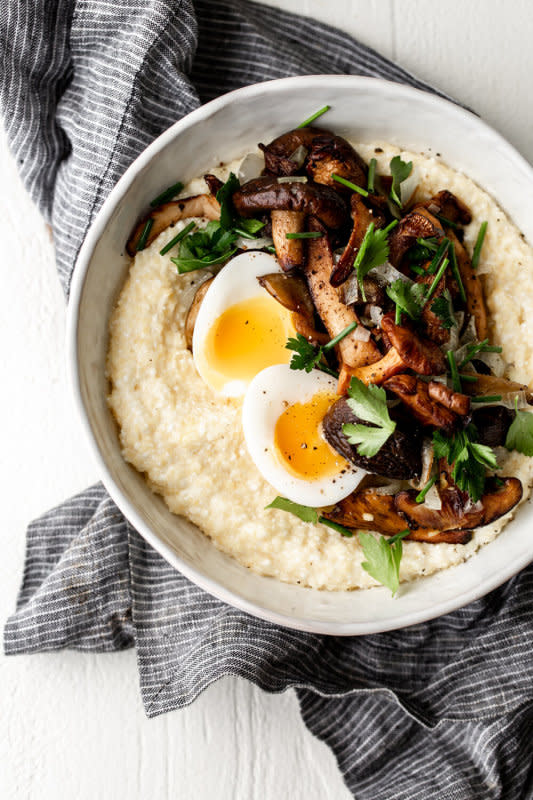 <p>Cooking with Cocktail Rings</p><p>Creamy Italian polenta with ricotta served topped with a springy and flavorful mix of sautéed mushrooms, leeks and a jammy 6-minute soft-boiled egg.</p><p><strong>Get the recipe: <a href="https://cookingwithcocktailrings.com/2017-creamy-ricotta-polenta-with-sauted-mushrooms-and-leeks/" rel="nofollow noopener" target="_blank" data-ylk="slk:Creamy Ricotta Polenta with Sauteed Mushrooms and Leeks;elm:context_link;itc:0;sec:content-canvas" class="link "><em>Creamy Ricotta Polenta with Sauteed Mushrooms and Leeks</em></a></strong></p><p><strong>Related: <a href="https://www.yahoo.com/lifestyle/13-recipes-instantly-more-delicious-150840783.html" data-ylk="slk:15 Ricotta Cheese Recipes;elm:context_link;itc:0;sec:content-canvas;outcm:mb_qualified_link;_E:mb_qualified_link;ct:story;" class="link  yahoo-link">15 Ricotta Cheese Recipes</a></strong></p>