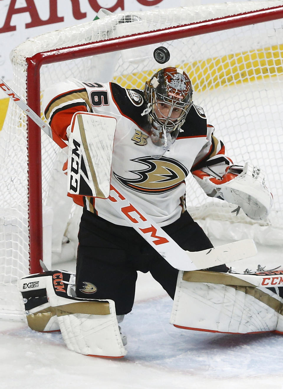 Anaheim Ducks goalie John Gibson deflects a Minnesota Wild shot in the first period of an NHL hockey game, Thursday, Jan. 17, 2019, in St. Paul, Minn. (AP Photo/Jim Mone)