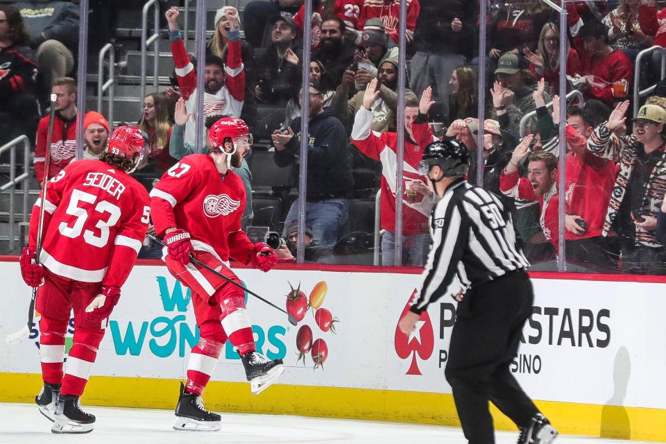 Detroit Red Wings center Michael Rasmussen (27) celebrates a goal against the Carolina Hurricanes during the second period at Little Caesars Arena in Detroit on Thursday, Dec. 14, 2023.