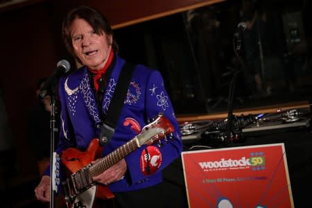 FILE PHOTO - Singer John Fogerty performs during the announcement event for the lineup of the Woodstock 50th Anniversary concert in New York
