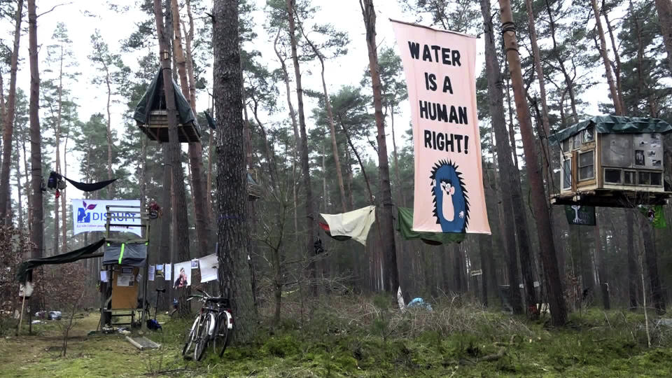 FILE - Activists occupy an area in the forest in Gruenheide, Germany, March 1, 2024. A local council in Germany on Friday May 17, 2024, approved a plan by electric carmaker Tesla to expand the grounds of its first plant in Europe, which has drawn persistent protests this year. (Cevin Dettlaff/dpa via AP, File)