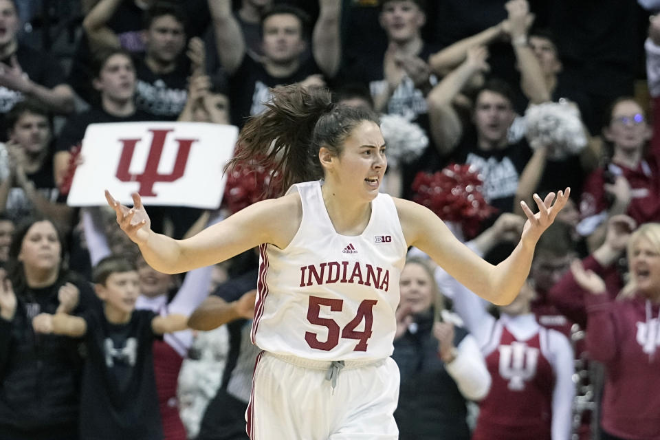 FILE - Indiana's Mackenzie Holmes reacts during the first half of an NCAA college basketball game against Ohio State, Thursday, Jan. 26, 2023, in Bloomington, Ind. Holmes was named to the preseason AP All-America women’s NCAA college basketball team, revealed Tuesday, Oct. 24, 2023.(AP Photo/Darron Cummings, File)