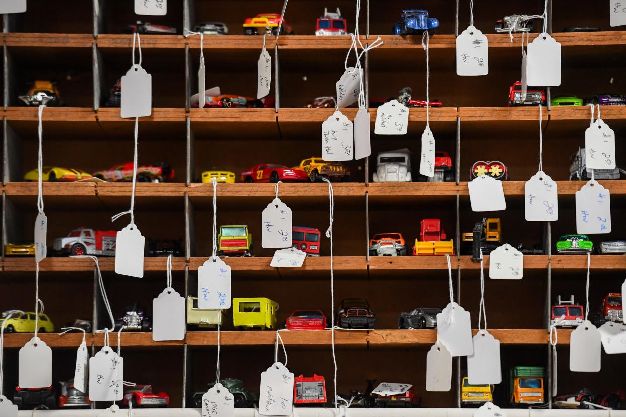 Shelves filled with toy cars for sale on Saturday, April 27, 2024, at Gift and Thrift in Sioux Falls.