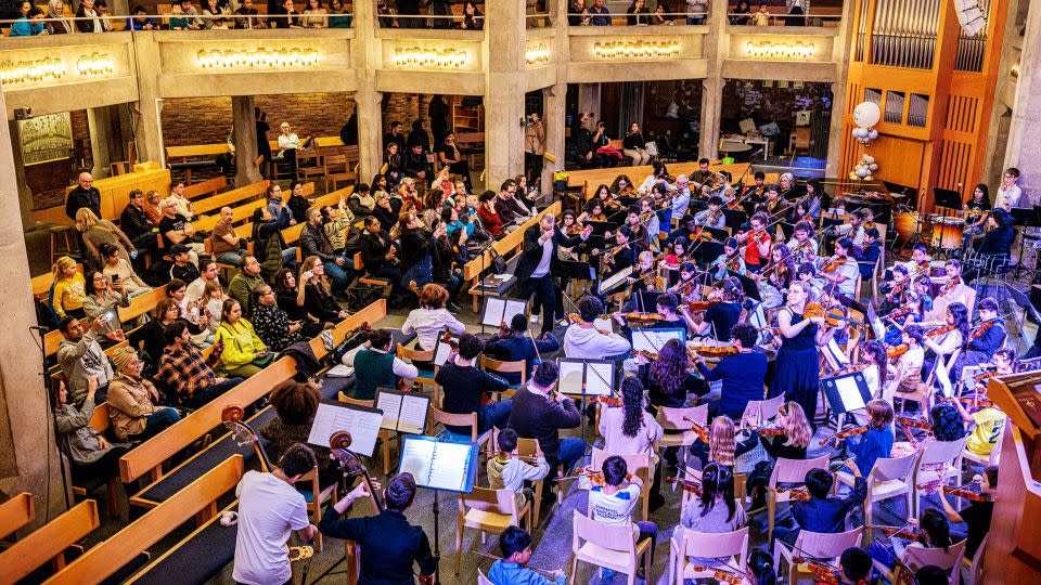 The Dream Orchestra performs at a church in Gothenburg. Álvarez says holding frequent concerts and setting goals has helped inspire his students. - Courtesy Emelie Asplund/Dream Orchestra