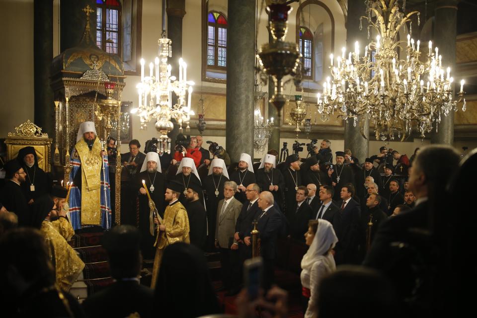 Metropolitan Epiphanius, the head of the independent Ukrainian Orthodox Church, top left, attends a religion service during a meeting to sign "Tomos" decree of autocephaly for Ukrainian church at the Patriarchal Church of St. George in Istanbul, Turkey, Saturday, Jan. 5, 2019. (AP Photo/Emrah Gurel)