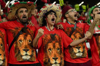Soccer fans supporting Morocco cheer prior to the World Cup round of 16 soccer match between Morocco and Spain, at the Education City Stadium in Al Rayyan, Qatar, Tuesday, Dec. 6, 2022. (AP Photo/Francisco Seco)