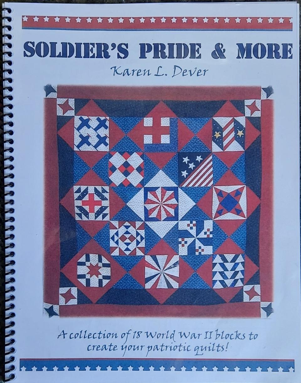 Karen Dever's book "Soldier's Pride and More" cover features the quilt that will be raffled off.