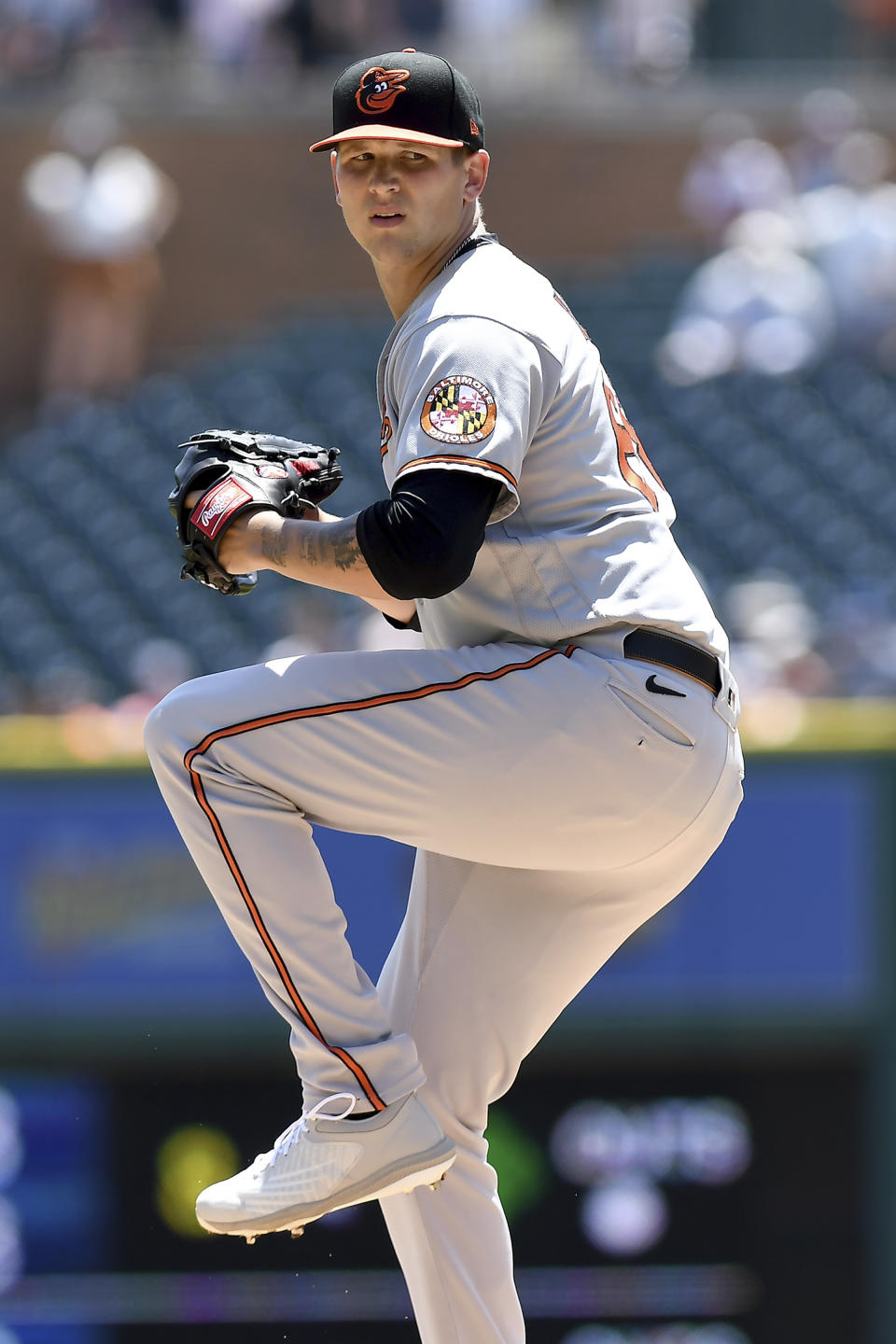 Baltimore Orioles pitcher Tyler Wells winds up to throw in the first inning of a baseball game against the Detroit Tigers in Detroit, Sunday, May 15, 2022. (AP Photo/Lon Horwedel)
