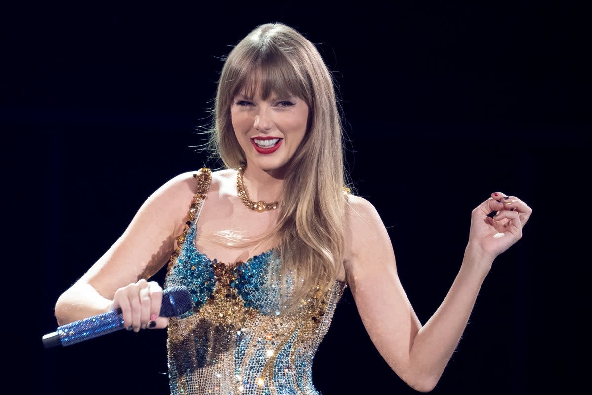 Taylor Swift jumped to the defence of a fan who was being hassled by security during one of her shows  (AFP via Getty Images)