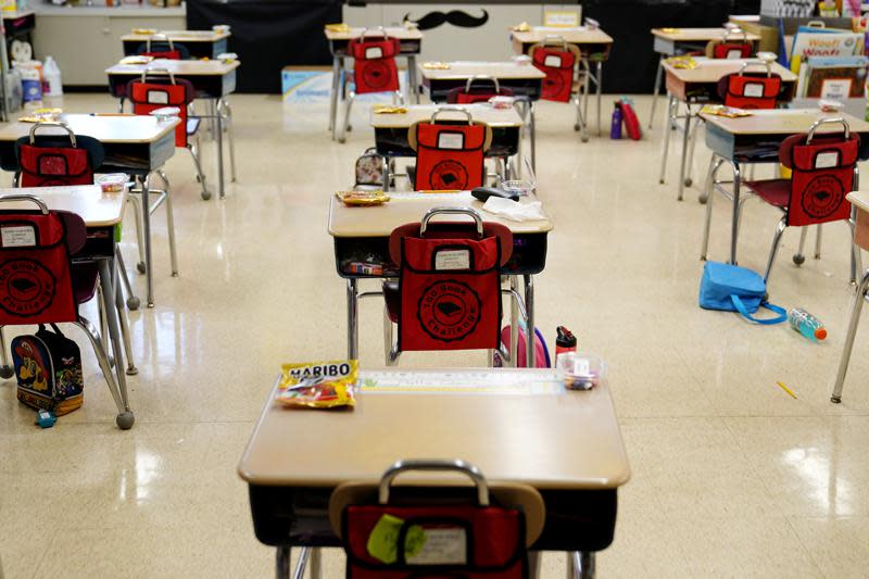 In this Thursday, March 11, 2021 file photo, desks are arranged in a classroom at an elementary school in Nesquehoning, Pa. (AP Photo/Matt Slocum, File)