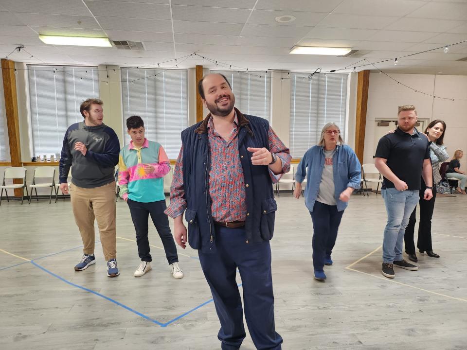 Amarillo Opera cast members of Verdi's "Rigoletto," from left, Chancelor Barbaree as Marullo, Nicholas Flott as Borsa, Eric Barry as the Duke of Montua, production director Ellen Schlaefer (substituting for Rigoletto), Travis Hyman as Ceprano, and Katrina Perales as Countess Ceprano rehearse for the upcoming production, to be held April 1 in the Globe-News Center for the Performing Arts.