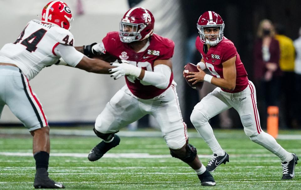 Jan 10, 2022; Indianapolis, IN, USA; Alabama quarterback Bryce Young (9) looks to pass behind the blocking of Alabama offensive lineman Chris Owens (79) during the 2022 CFP college football national championship game at Lucas Oil Stadium. Mandatory Credit: Gary Cosby Jr.-USA TODAY Sports