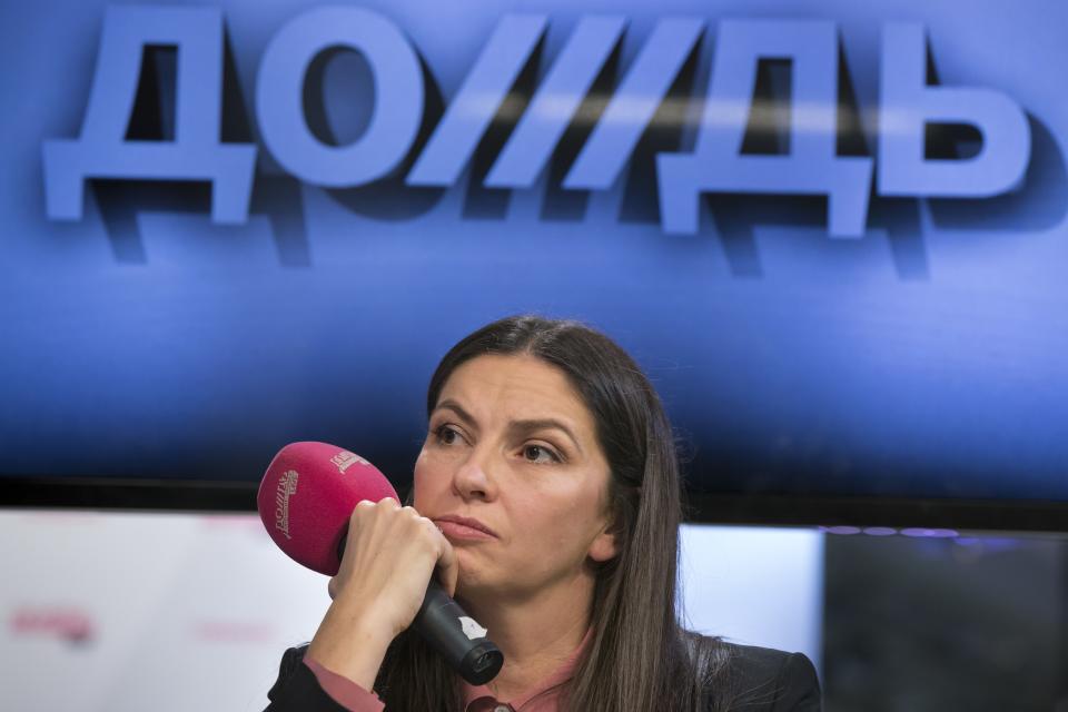 FILE - In this Tuesday Feb. 4, 2014 file photo, Dozhd's director Nataliya Sindeyeva waits for a question during a press conference at the channel's headquarters in Moscow, Russia. The independent television station Dozhd, or TV Rain, came under attack after asking viewers in January whether the Soviet Union should have surrendered Leningrad, now St. Petersburg, to save the lives of the 1 million people who died during the nearly 900-day Nazi siege of the city during the war. The station quickly pulled the poll and apologized, but President Vladimir Putin’s spokesman said the station had crossed a “red line.” Russian cable operators lined up to drop Dozhd from their packages and prosecutors opened an investigation. (AP Photo/Alexander Zemlianichenko, file)