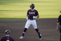 Mississippi State's Logan Tanner (19) skips as he rounds third base after hitting a second-inning three-run home run against Notre Dame during an NCAA college baseball super regional game, Monday, June 14, 2021, in Starkville, Miss. (AP Photo/Rogelio V. Solis)