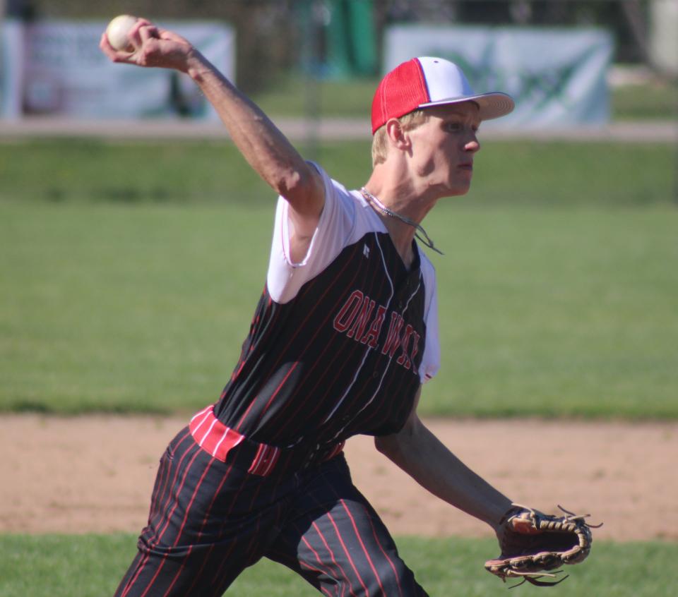 Onaway senior pitcher Jadin Mix deals during game one against Pellston on Friday.