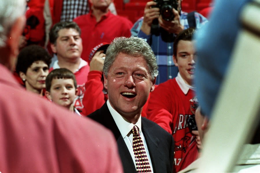 28 DEC 1993: PRESIDENT BILL CLINTON SMILES DURING A NON-CONFERENCE GAME BETWEEN THE ARKANSAS RAZORBACKS AND THE TEXAS SOUTHERN TIGERS.