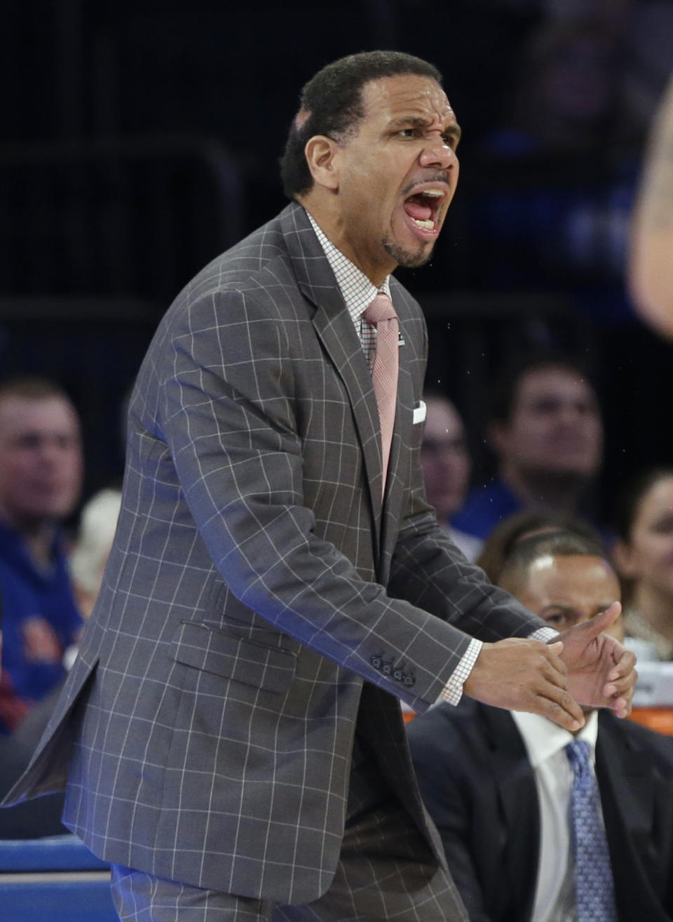 Providence coach Ed Cooley calls out to his team during the first half of an NCAA college basketball game against Seton Hall in the semifinals of the Big East Conference men's tournament Friday, March 14, 2014, at Madison Square Garden in New York. (AP Photo/Frank Franklin II)