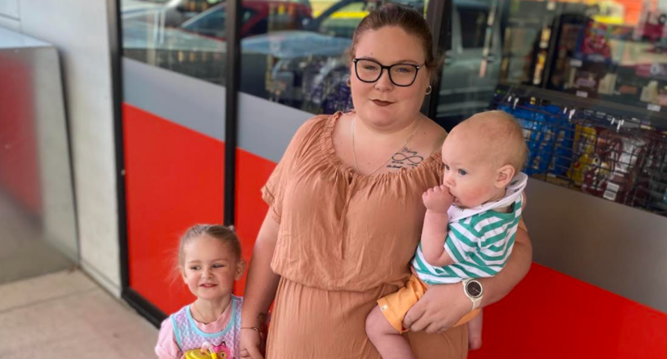 Woolworths shopper Amelia with her two kids.