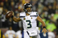 Seattle Seahawks quarterback Russell Wilson (3) throws the ball during the first half of an NFL football game against the Washington Football Team, Monday, Nov. 29, 2021, in Landover, Md. (AP Photo/Nick Wass)