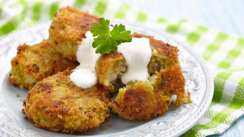 potato and brussels sprouts pancakes with sour cream