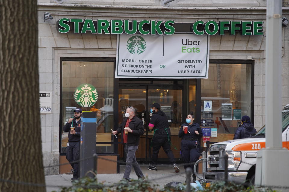 NEW YORK, NEW YORK,  - APRIL 14: A Starbucks remains open for take-out during the coronavirus pandemic on April 14, 2020 in New York City. Shelter-In-Place and social distancing continues across the city, emptying streets and businesses to curb the spread of the coronavirus, COVID-19. (Photo by Rob Kim/Getty Images)