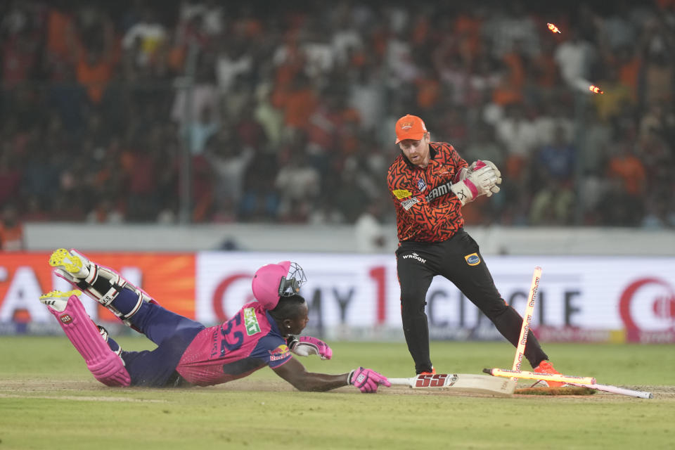 Rajasthan Royals' Rovman Powell dives into the crease successfully during the Indian Premier League cricket match between Sunrisers Hyderabad and Rajasthan Royals in Hyderabad, India, Thursday, May 2, 2024. (AP Photo/Mahesh Kumar A.)