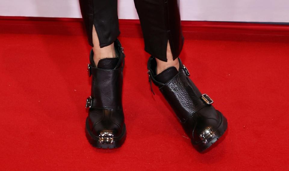 Close Up of Sheryl Crow in Miu Miu biker boots<cite>GETTY IMAGES</cite>